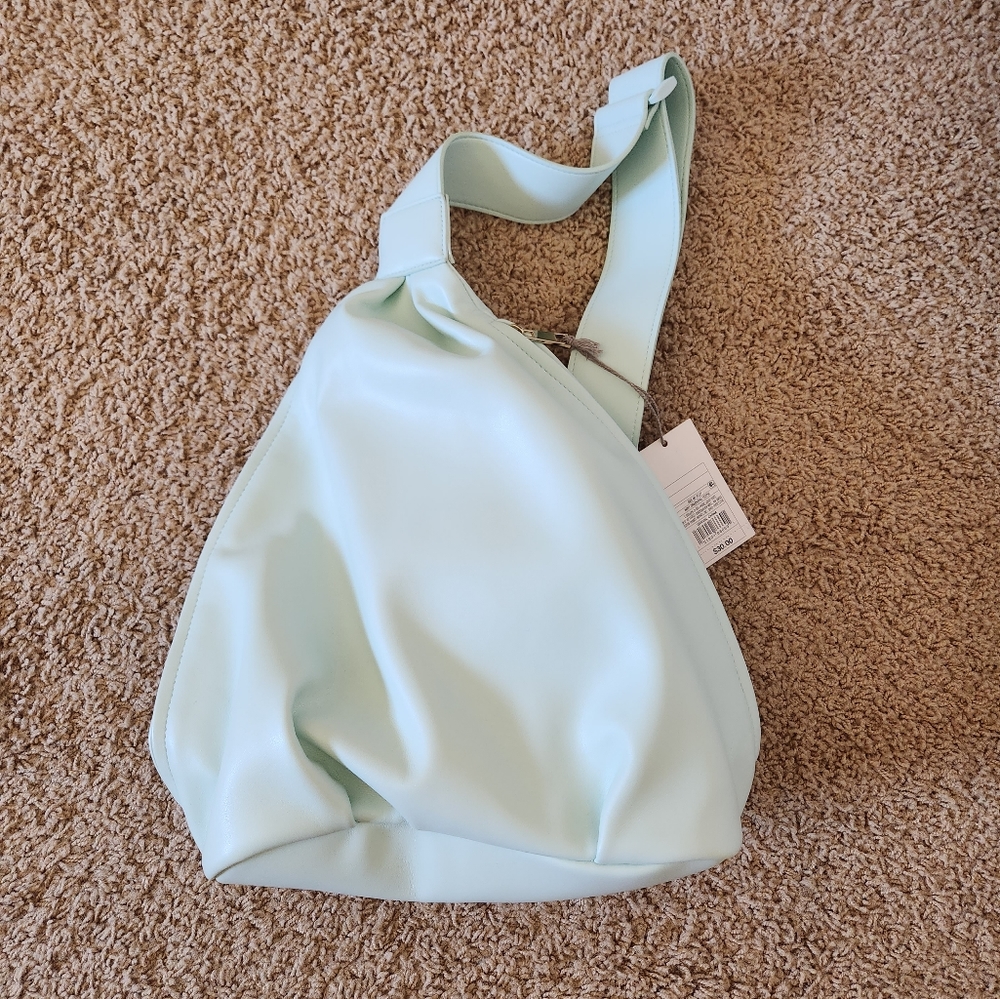 NWT mint green single strap faux leather backpack